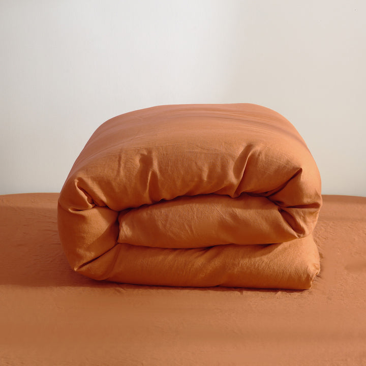 Luxurious caramel linen duvet cover, creating a warm and inviting sleep retreat.