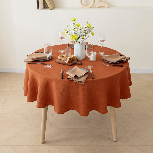 Handcrafted caramel linen tablecloth, ideal for Thanksgiving and autumn-inspired table settings.